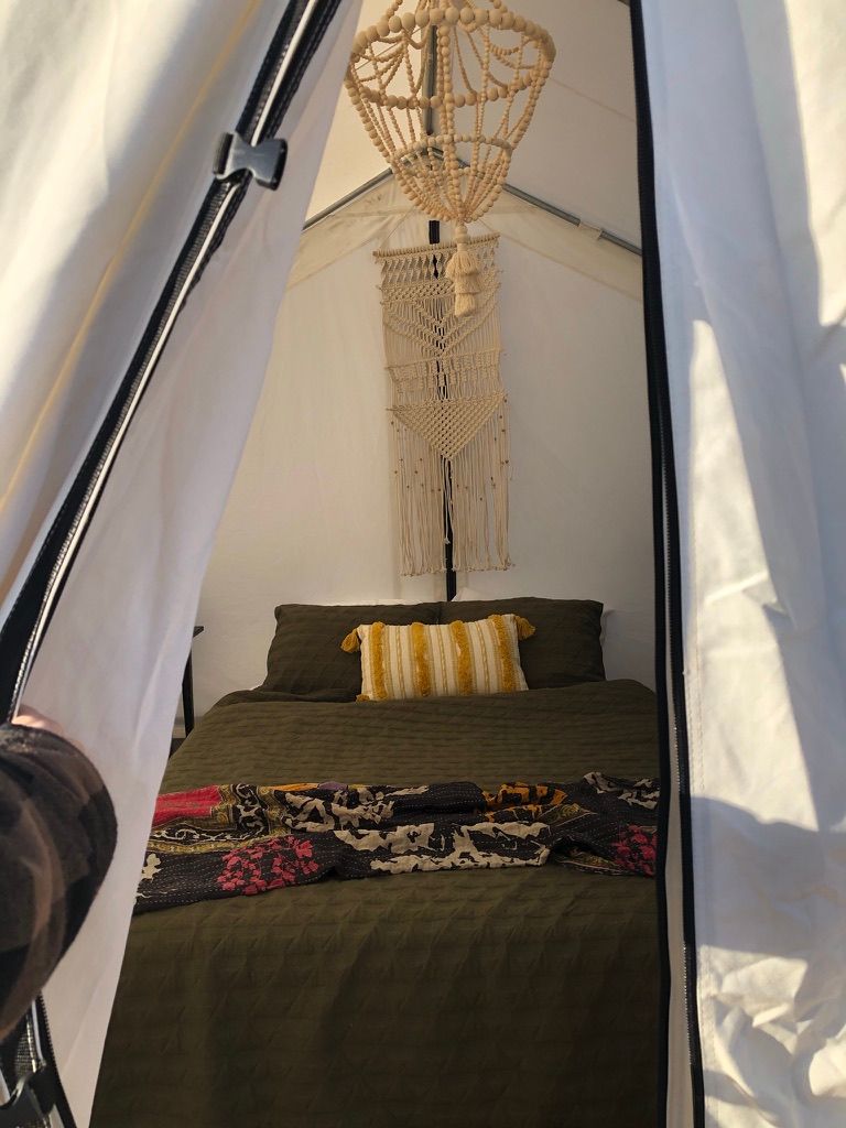 queen sized bed at the glamping village in arizona