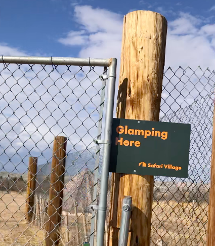 Welcome sign at the Glamping Village