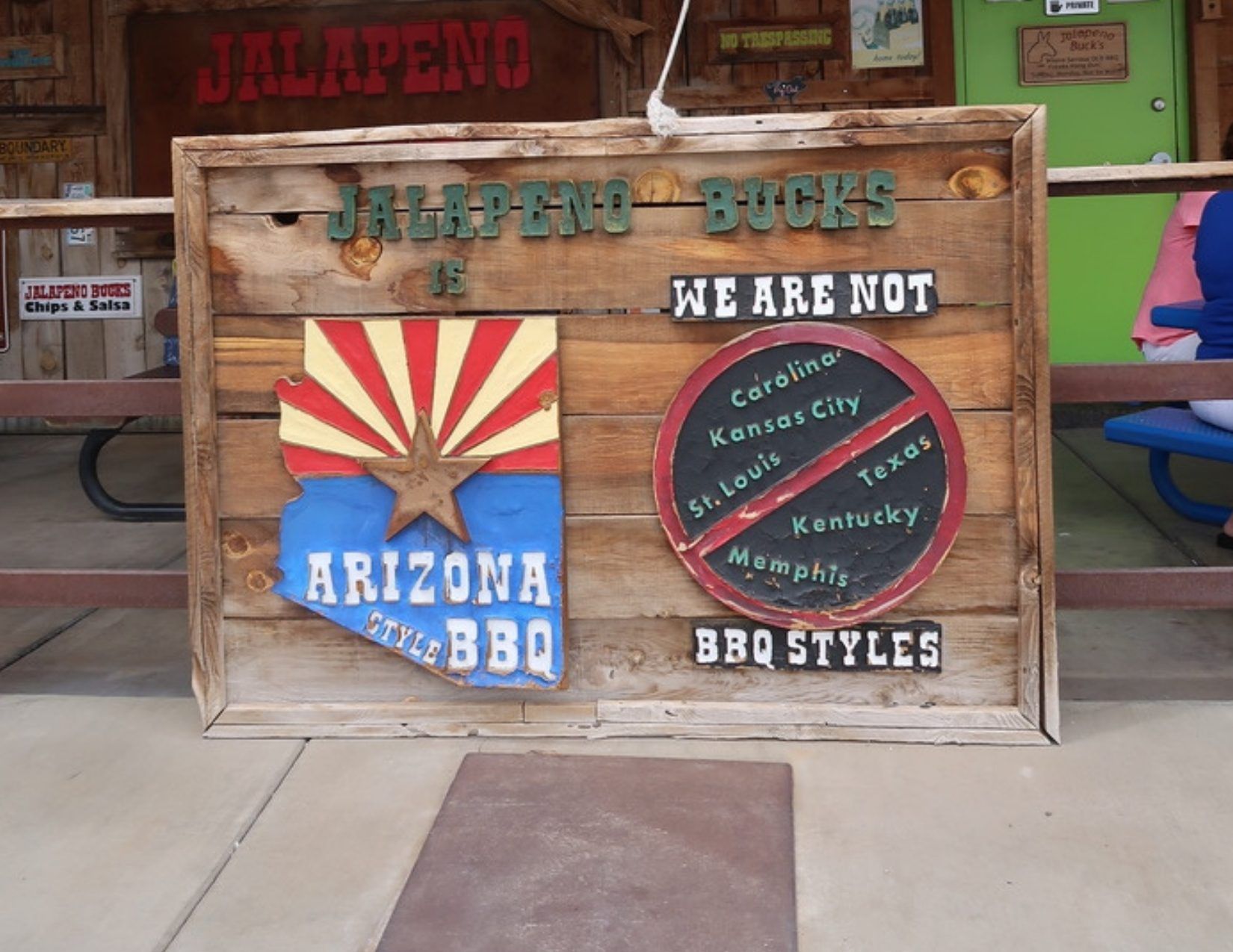 Sign for Jalapeno Bucks with Arizona flag on the Fresh Foodie Trail in Mesa Arizona