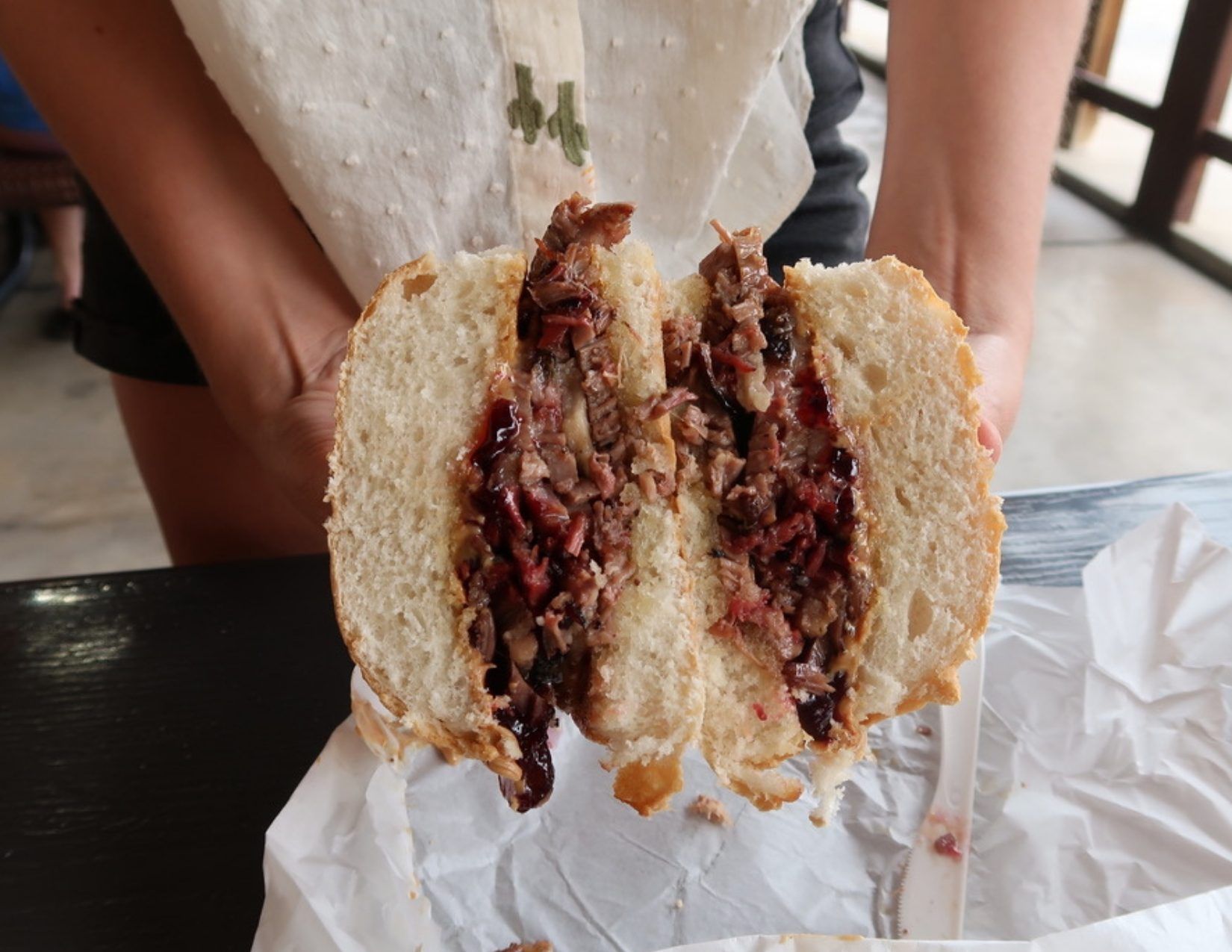 BBQ sandwich split in half on the Fresh Foodie Trail in Mesa Arizona