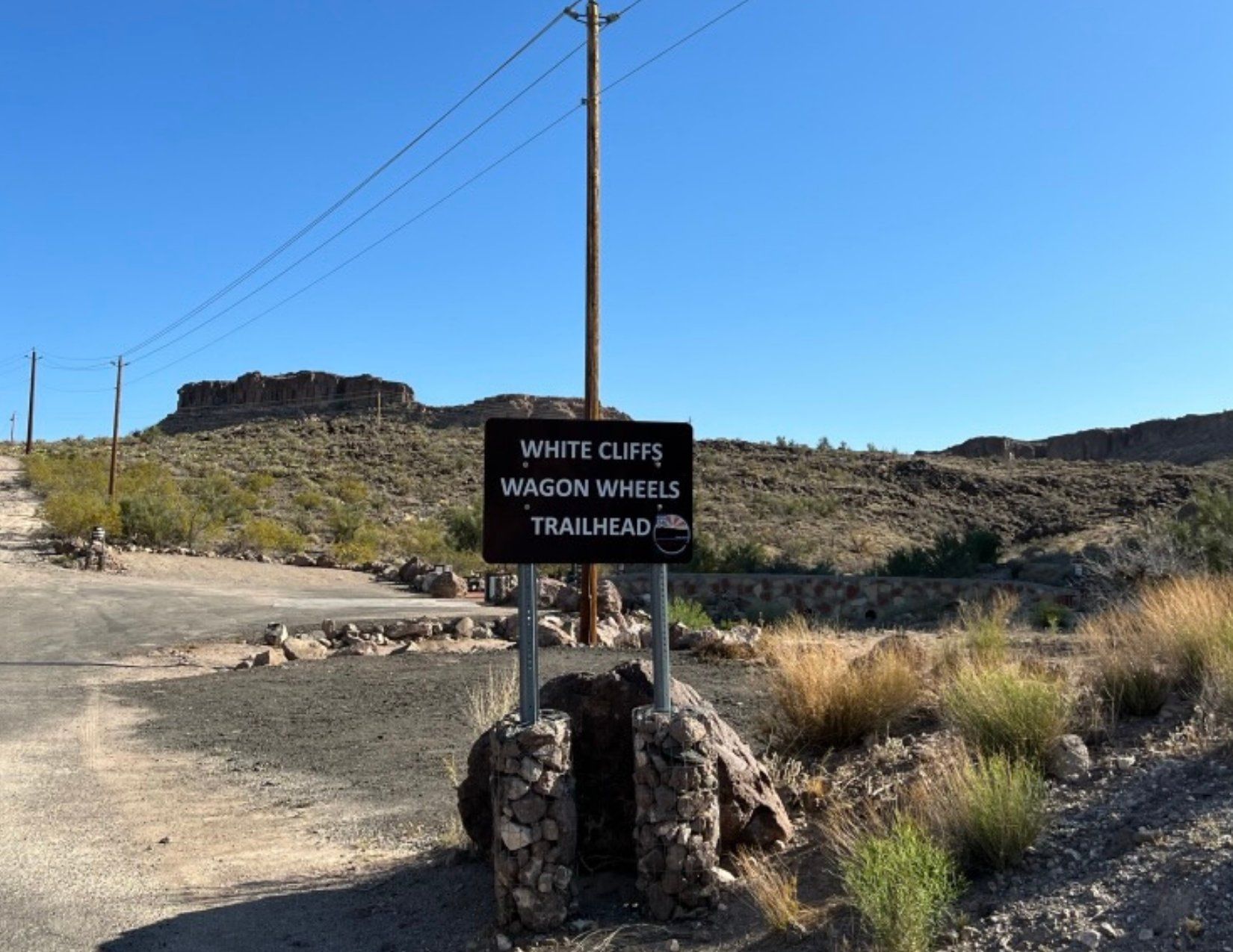 Metal Signpost showing White Cliffs Wagon Wheels Trailhead in Kingman Arizona