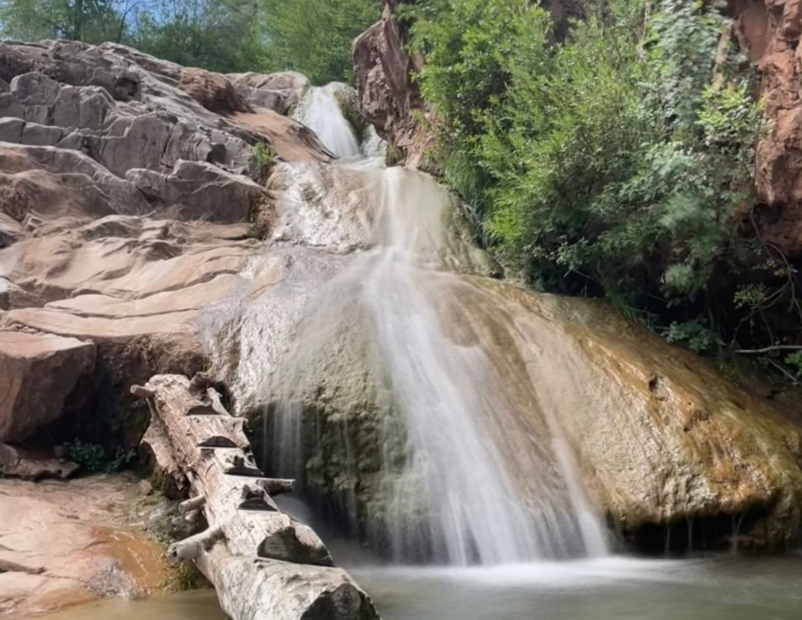 Fresh cold water rushing down the rocks at Ellison Creek and Water Wheel Falls in Payson Arizona
