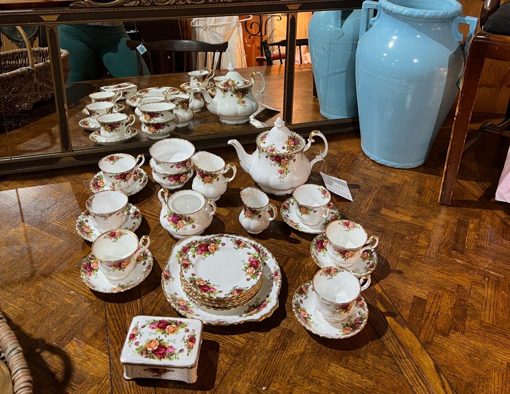 Full white tea set with pink and orange flowers in Ogunquit, Maine