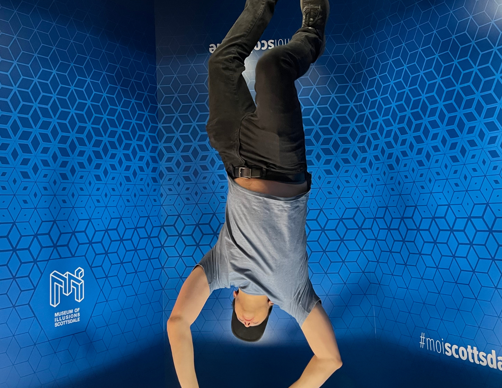 An illusion of a man floating upside down at Museum of Illusions Scottsdale near Phoenix, Arizona