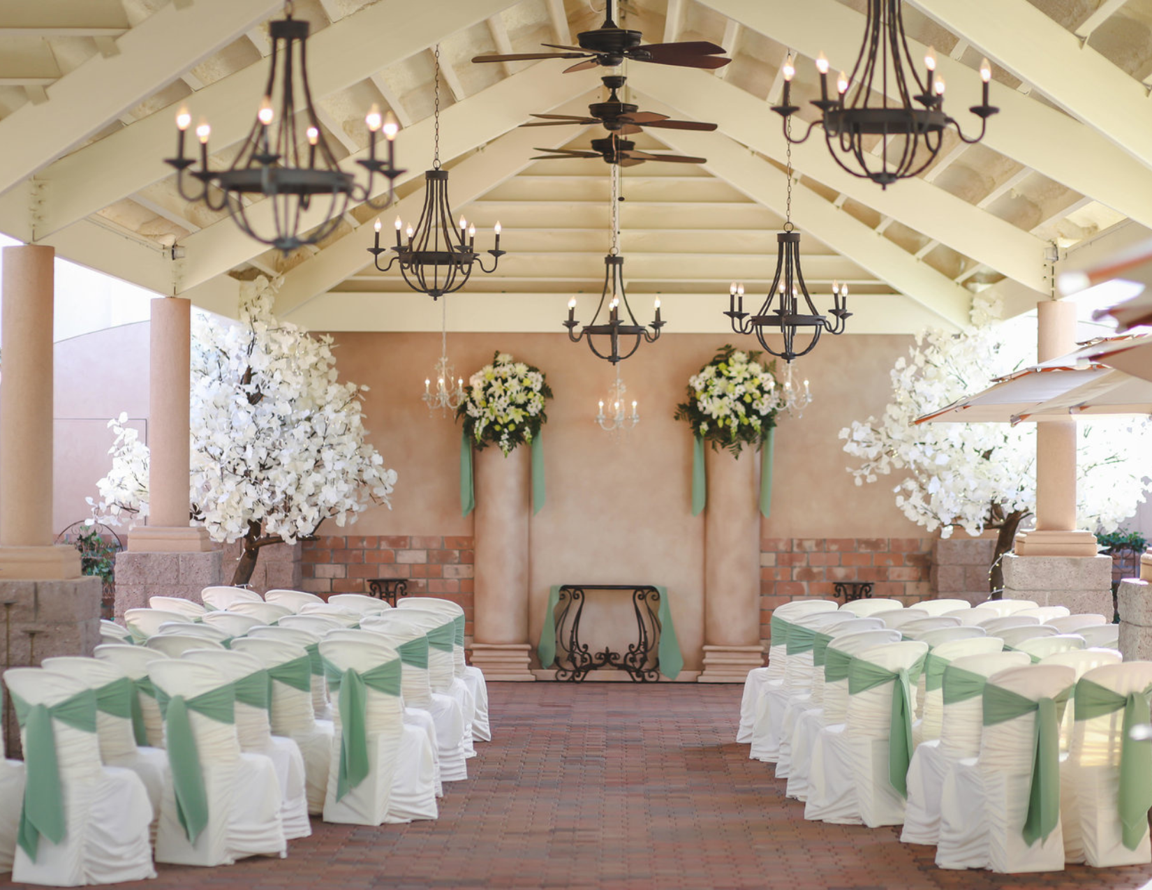 A beautiful elopement ceremony with white cloths and chandeliers near Mesa, Arizona