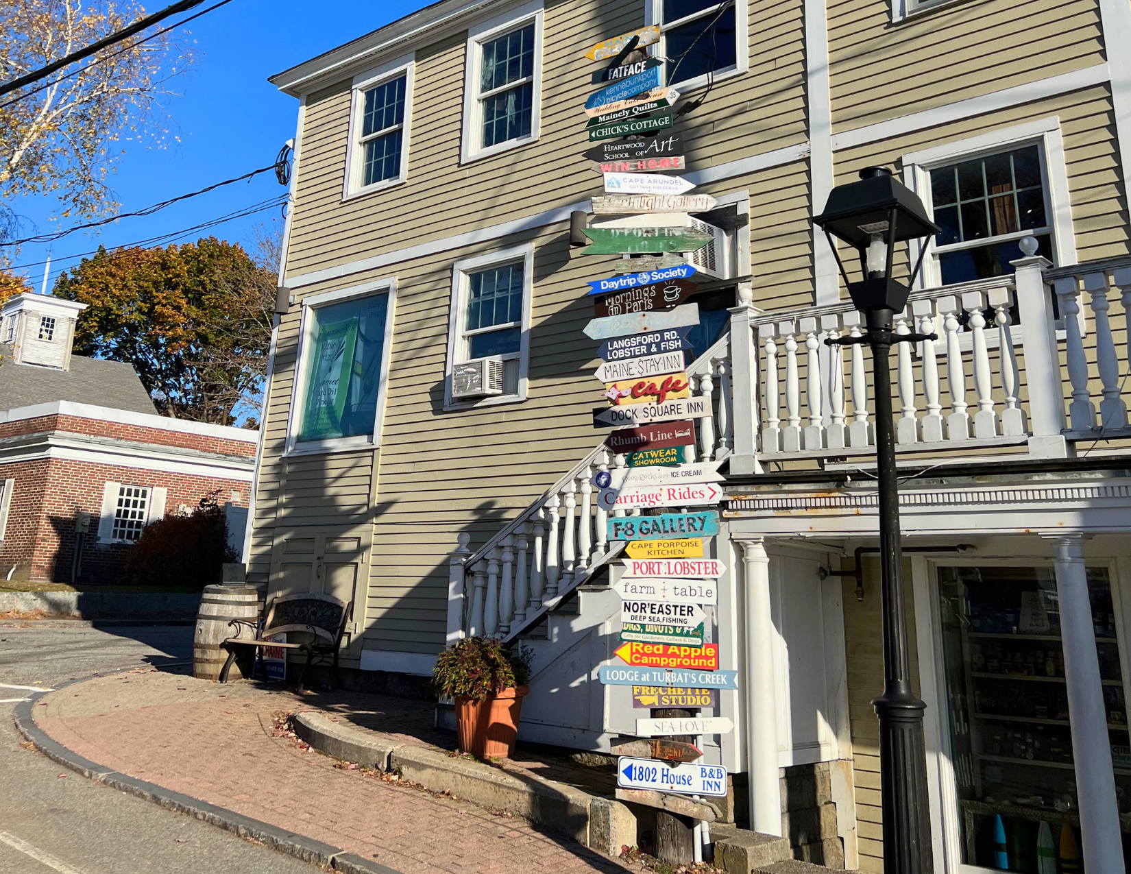 Colorful directional street signs on arrows in Kennebunkport, Maine