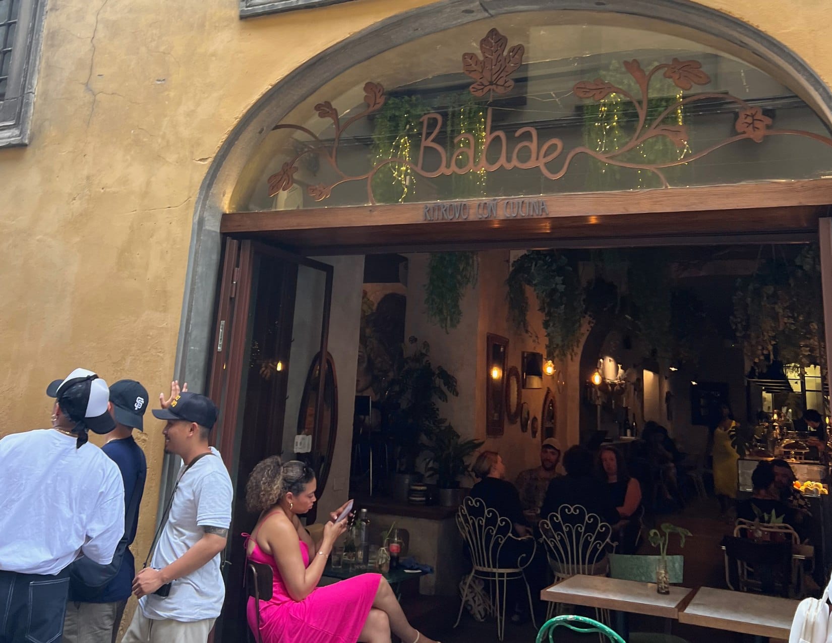 People waiting outside of Babae in Florence, Italy