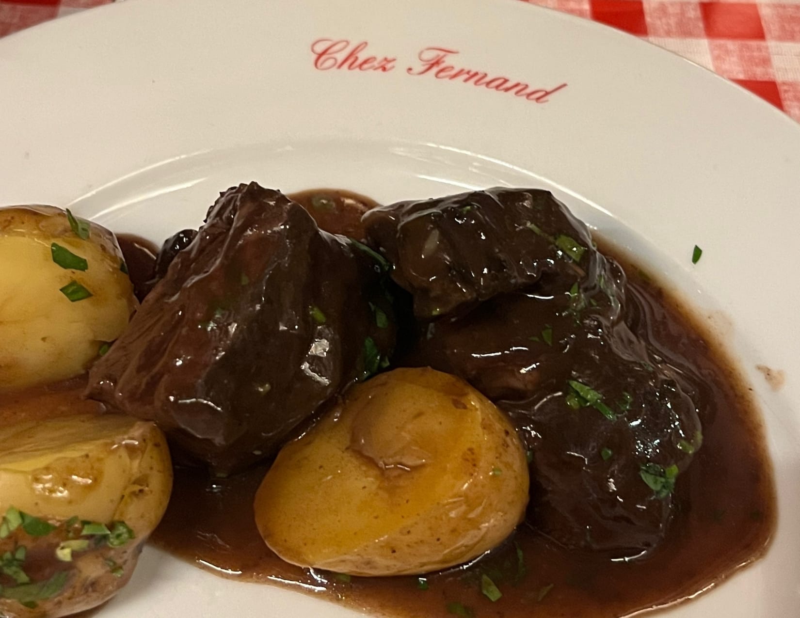 beef bourguignon dish from Chez Fernand in Paris, France