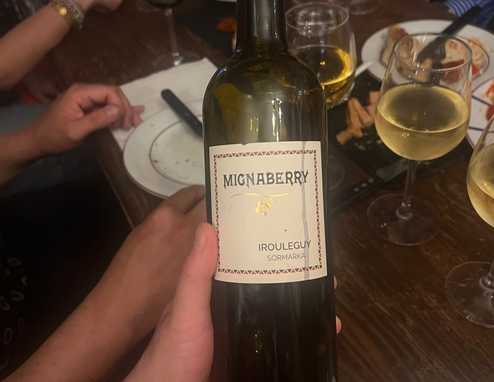 Empty wine bottle of Mignaberry Red wine at Osaba in Paris, France