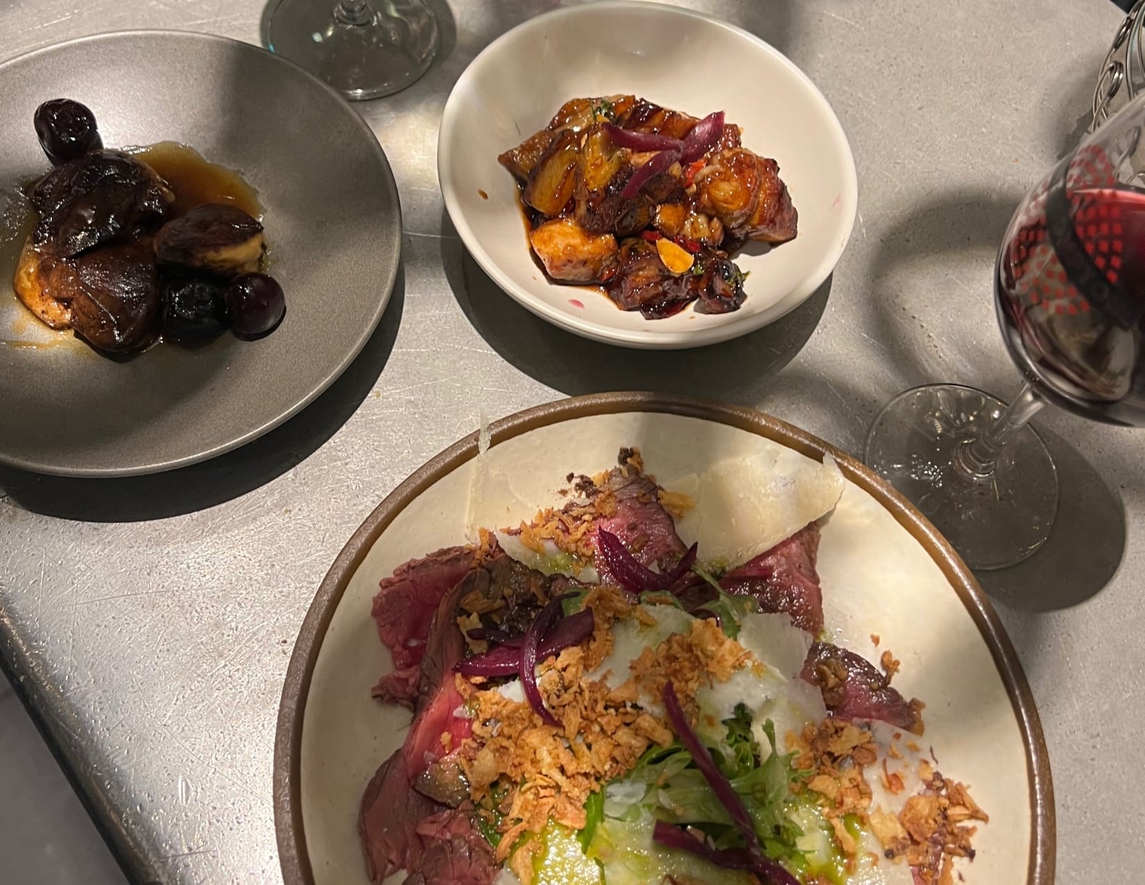 3 plates of delicious food at L'avant Comptoir de la Terre in Paris, France