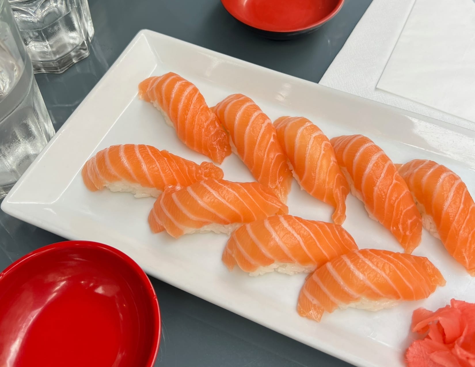 Pieces of salmon nigiri sushi from Ta Sushi in Paris, France