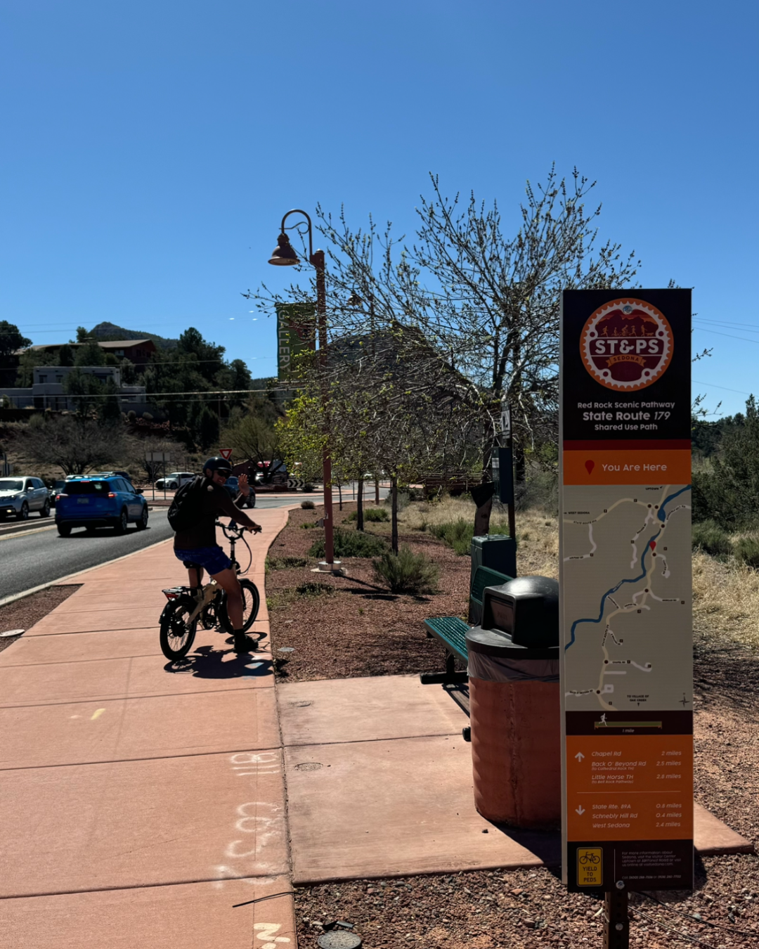 Man on bike looking back and smiling in Sedona, Arizona